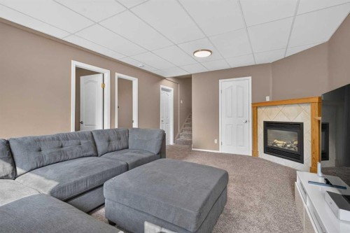 4 Citadel Manor Nw, Calgary, AB - Indoor Photo Showing Living Room With Fireplace