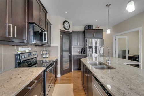 288 Evansborough Way Nw, Calgary, AB - Indoor Photo Showing Kitchen With Stainless Steel Kitchen With Double Sink With Upgraded Kitchen