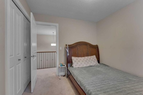 288 Evansborough Way Nw, Calgary, AB - Indoor Photo Showing Bedroom