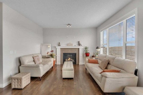 288 Evansborough Way Nw, Calgary, AB - Indoor Photo Showing Living Room With Fireplace