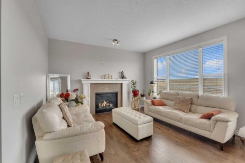 288 Evansborough Way Nw, Calgary, AB - Indoor Photo Showing Living Room With Fireplace