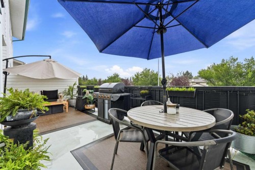 42H Green Meadow Crescent, Strathmore, AB - Outdoor With Deck Patio Veranda With Exterior