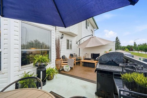 42H Green Meadow Crescent, Strathmore, AB - Outdoor With Deck Patio Veranda With Exterior