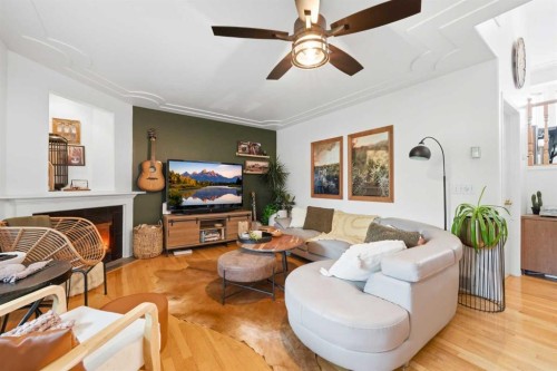 42H Green Meadow Crescent, Strathmore, AB - Indoor Photo Showing Living Room With Fireplace
