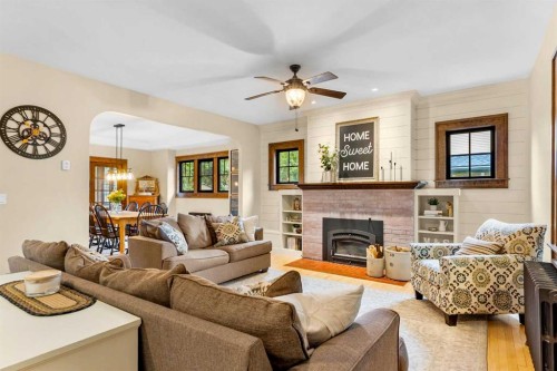 4730 50 Street, Olds, AB - Indoor Photo Showing Living Room With Fireplace