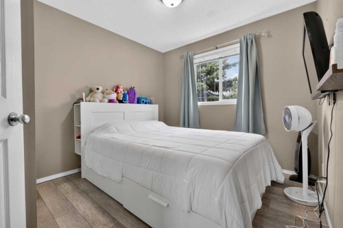 66 Panatella Park Nw, Calgary, AB - Indoor Photo Showing Bedroom