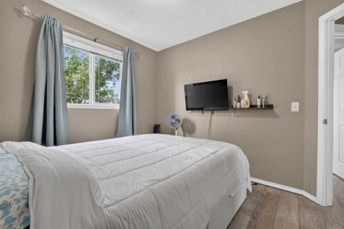 66 Panatella Park Nw, Calgary, AB - Indoor Photo Showing Bedroom