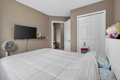66 Panatella Park Nw, Calgary, AB - Indoor Photo Showing Bedroom