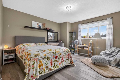 66 Panatella Park Nw, Calgary, AB - Indoor Photo Showing Bedroom