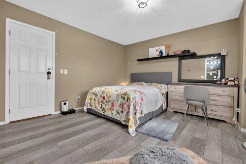 66 Panatella Park Nw, Calgary, AB - Indoor Photo Showing Bedroom
