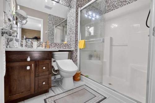 66 Panatella Park Nw, Calgary, AB - Indoor Photo Showing Bathroom