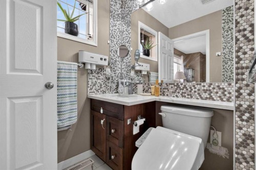 66 Panatella Park Nw, Calgary, AB - Indoor Photo Showing Bathroom