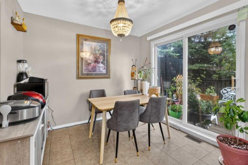66 Panatella Park Nw, Calgary, AB - Indoor Photo Showing Dining Room