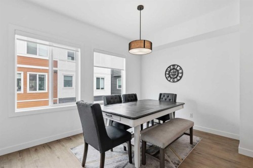 602-335 Creekside Boulevard Sw, Calgary, AB - Indoor Photo Showing Dining Room