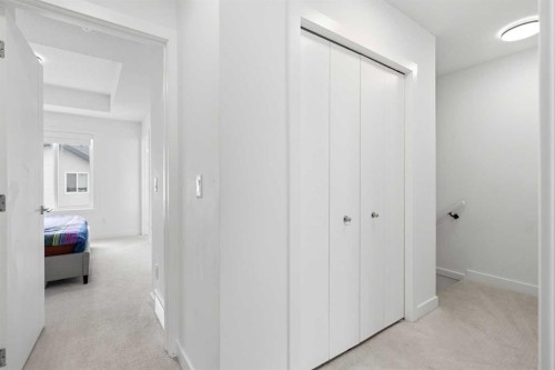 602-335 Creekside Boulevard Sw, Calgary, AB - Indoor Photo Showing Other Room