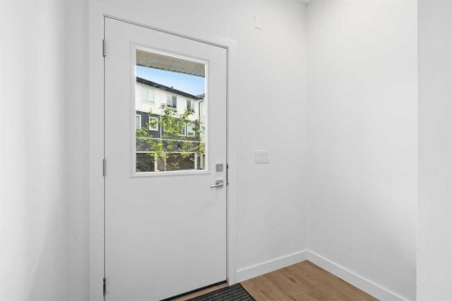 602-335 Creekside Boulevard Sw, Calgary, AB - Indoor Photo Showing Other Room