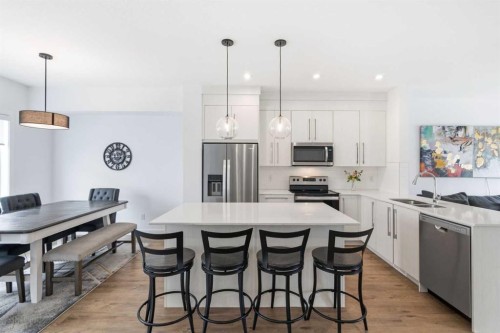 602-335 Creekside Boulevard Sw, Calgary, AB - Indoor Photo Showing Kitchen With Stainless Steel Kitchen With Double Sink With Upgraded Kitchen