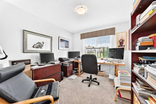 302 Sunset Point, Cochrane, AB - Indoor Photo Showing Office