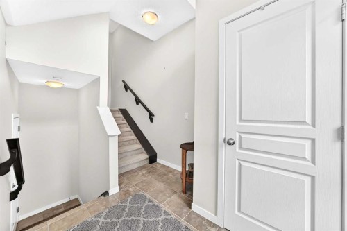 302 Sunset Point, Cochrane, AB - Indoor Photo Showing Other Room