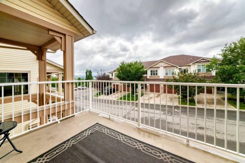 302 Sunset Point, Cochrane, AB - Outdoor With Deck Patio Veranda With Exterior