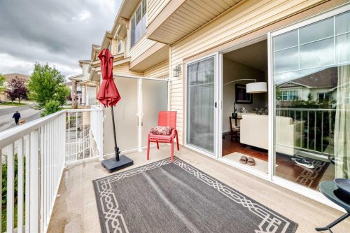 302 Sunset Point, Cochrane, AB - Outdoor With Balcony