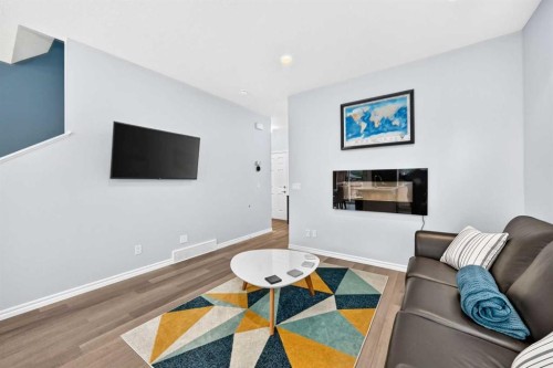 230 Legacy Mews Se, Calgary, AB - Indoor Photo Showing Living Room With Fireplace