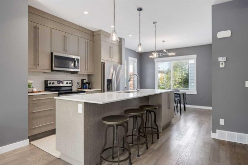 17-111 Rainbow Falls Gate, Chestermere, AB - Indoor Photo Showing Kitchen With Upgraded Kitchen