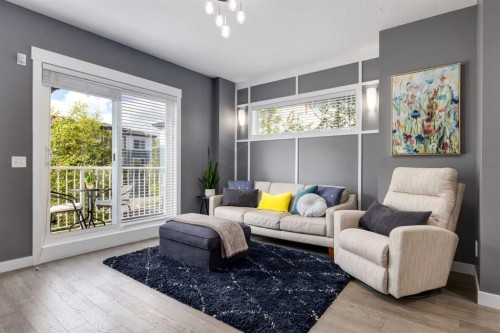 17-111 Rainbow Falls Gate, Chestermere, AB - Indoor Photo Showing Living Room