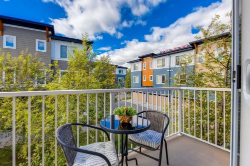 17-111 Rainbow Falls Gate, Chestermere, AB - Outdoor With Balcony With Exterior