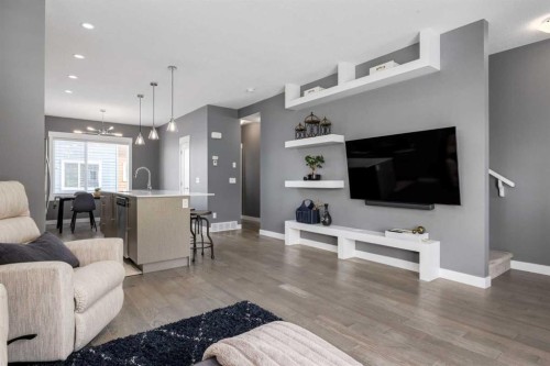 17-111 Rainbow Falls Gate, Chestermere, AB - Indoor Photo Showing Living Room