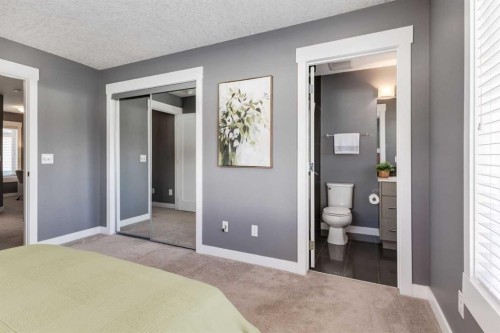 17-111 Rainbow Falls Gate, Chestermere, AB - Indoor Photo Showing Bedroom