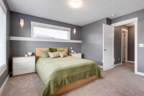 17-111 Rainbow Falls Gate, Chestermere, AB - Indoor Photo Showing Bedroom