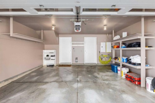 17-111 Rainbow Falls Gate, Chestermere, AB - Indoor Photo Showing Garage