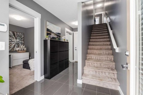 17-111 Rainbow Falls Gate, Chestermere, AB - Indoor Photo Showing Other Room