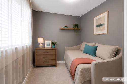 17-111 Rainbow Falls Gate, Chestermere, AB - Indoor Photo Showing Bedroom