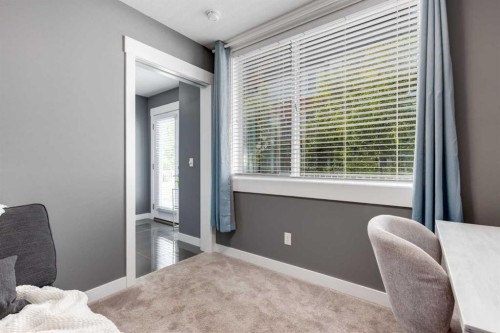 17-111 Rainbow Falls Gate, Chestermere, AB - Indoor Photo Showing Bedroom