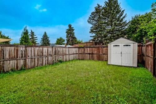 3881 Fonda Way Se, Calgary, AB - Outdoor With Backyard