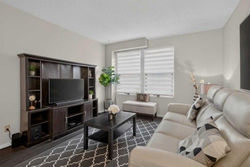 3881 Fonda Way Se, Calgary, AB - Indoor Photo Showing Living Room