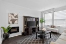3881 Fonda Way Se, Calgary, AB  - Indoor Photo Showing Living Room 