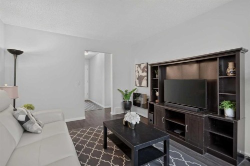 3881 Fonda Way Se, Calgary, AB - Indoor Photo Showing Living Room