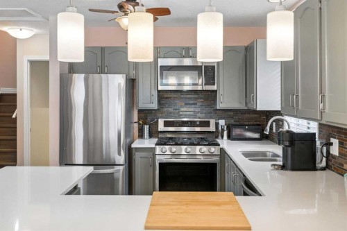 1840 33 Avenue Sw, Calgary, AB - Indoor Photo Showing Kitchen With Stainless Steel Kitchen With Double Sink With Upgraded Kitchen