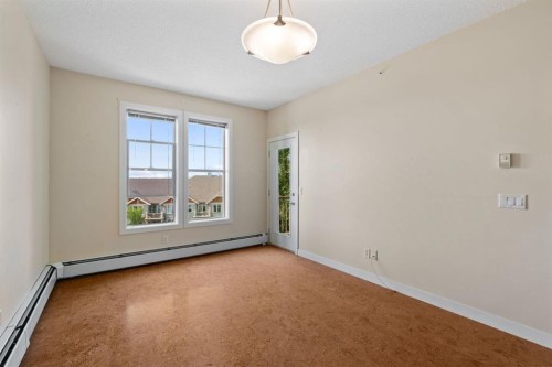 407-201 Sunset Drive, Cochrane, AB - Indoor Photo Showing Other Room