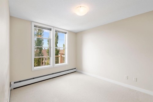 407-201 Sunset Drive, Cochrane, AB - Indoor Photo Showing Other Room