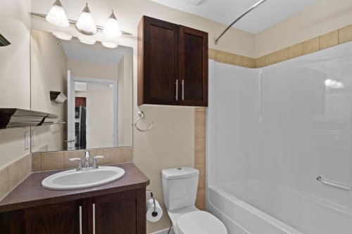 407-201 Sunset Drive, Cochrane, AB - Indoor Photo Showing Bathroom