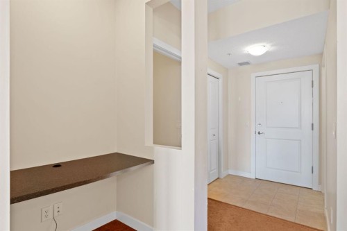 407-201 Sunset Drive, Cochrane, AB - Indoor Photo Showing Other Room