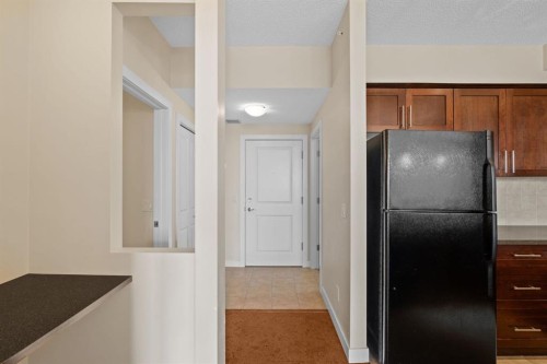 407-201 Sunset Drive, Cochrane, AB - Indoor Photo Showing Other Room