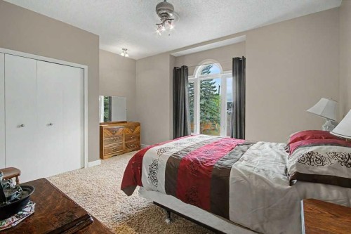 43 Riverside Road Se, Calgary, AB - Indoor Photo Showing Bedroom