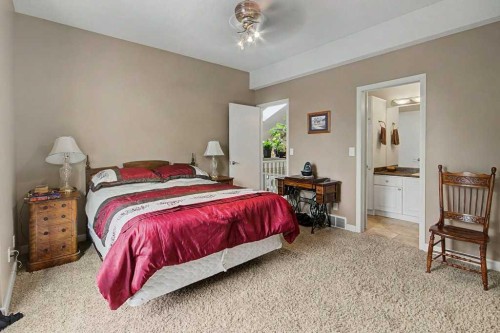 43 Riverside Road Se, Calgary, AB - Indoor Photo Showing Bedroom