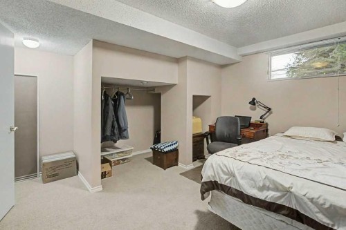 43 Riverside Road Se, Calgary, AB - Indoor Photo Showing Bedroom
