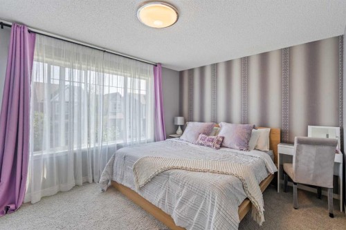 191 Cranford Crescent Se, Calgary, AB - Indoor Photo Showing Bedroom